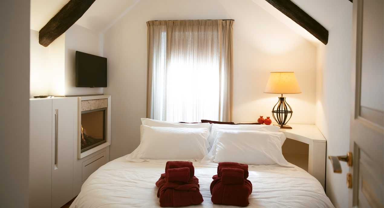 Camera da letto romantica con camino - Suite San Martino